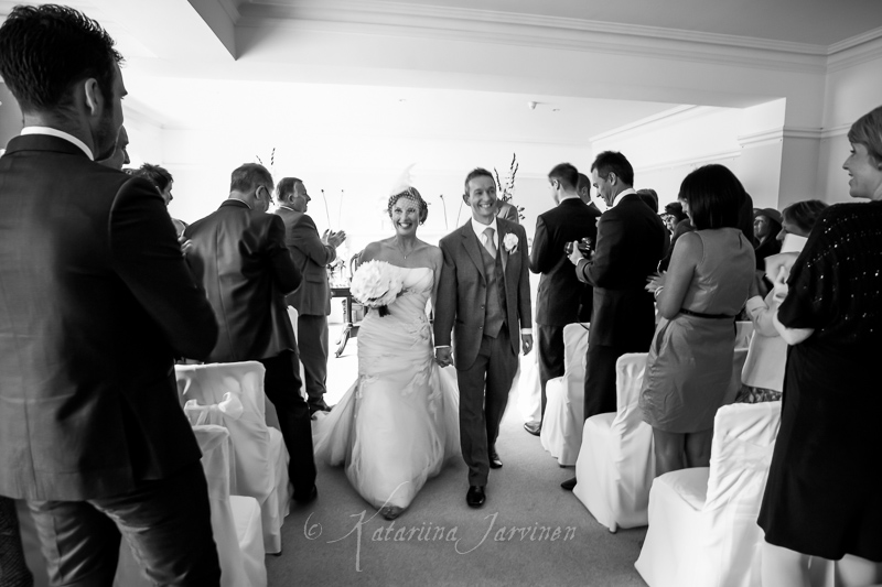 _MG_6405 bride and groom walking down the aisle